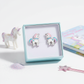 Melchior Jewellery unicorn stud earrings for girls in pastel colours displayed in a blue gift box