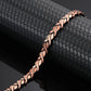 Melchior Jewellery womens copper magnetic bracelet with twisted leaf link design on black textured display