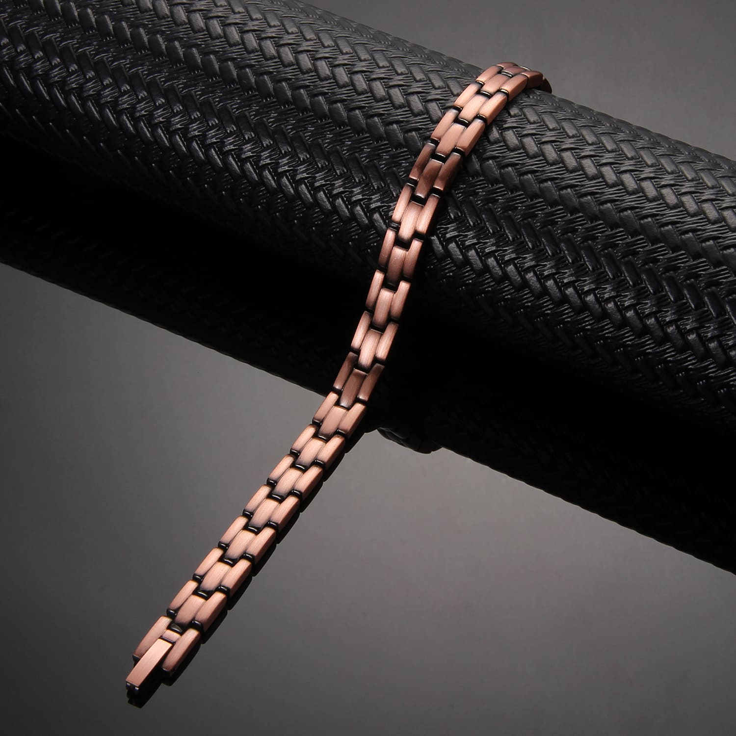 Melchior Jewellery womens copper magnetic therapy bracelet slim linked design on black textured display