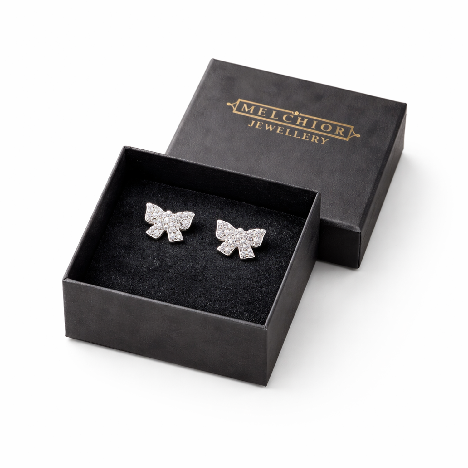Crystal bow earrings for kids in black Melchior Jewellery box with sparkling stones