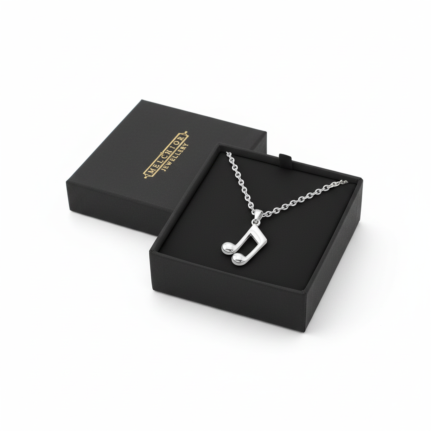 Sterling silver music note necklace by Melchior Jewellery displayed in black gift box