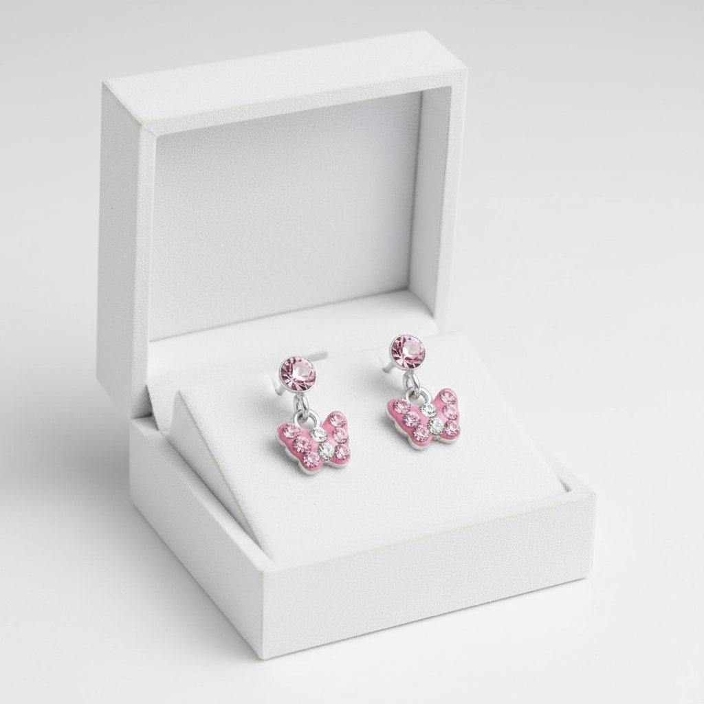 Melchior Jewellery pink butterfly drop earrings for girls with crystal details in a white jewellery box