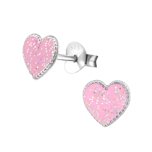Pink glitter heart stud earrings for kids made by Melchior Jewellery with silver settings