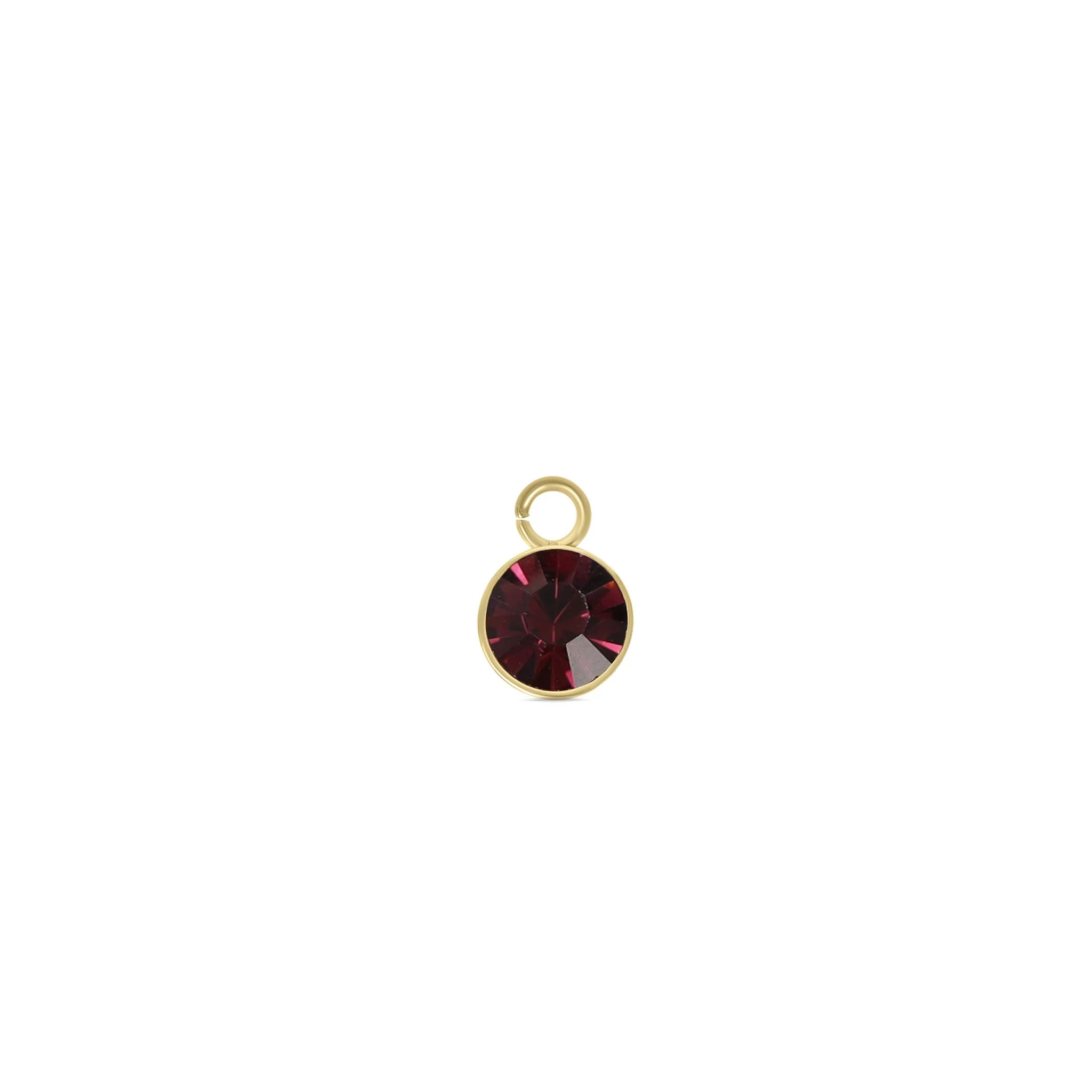 gold stainless steel birthstone charm with deep red gemstone for personalised jewellery