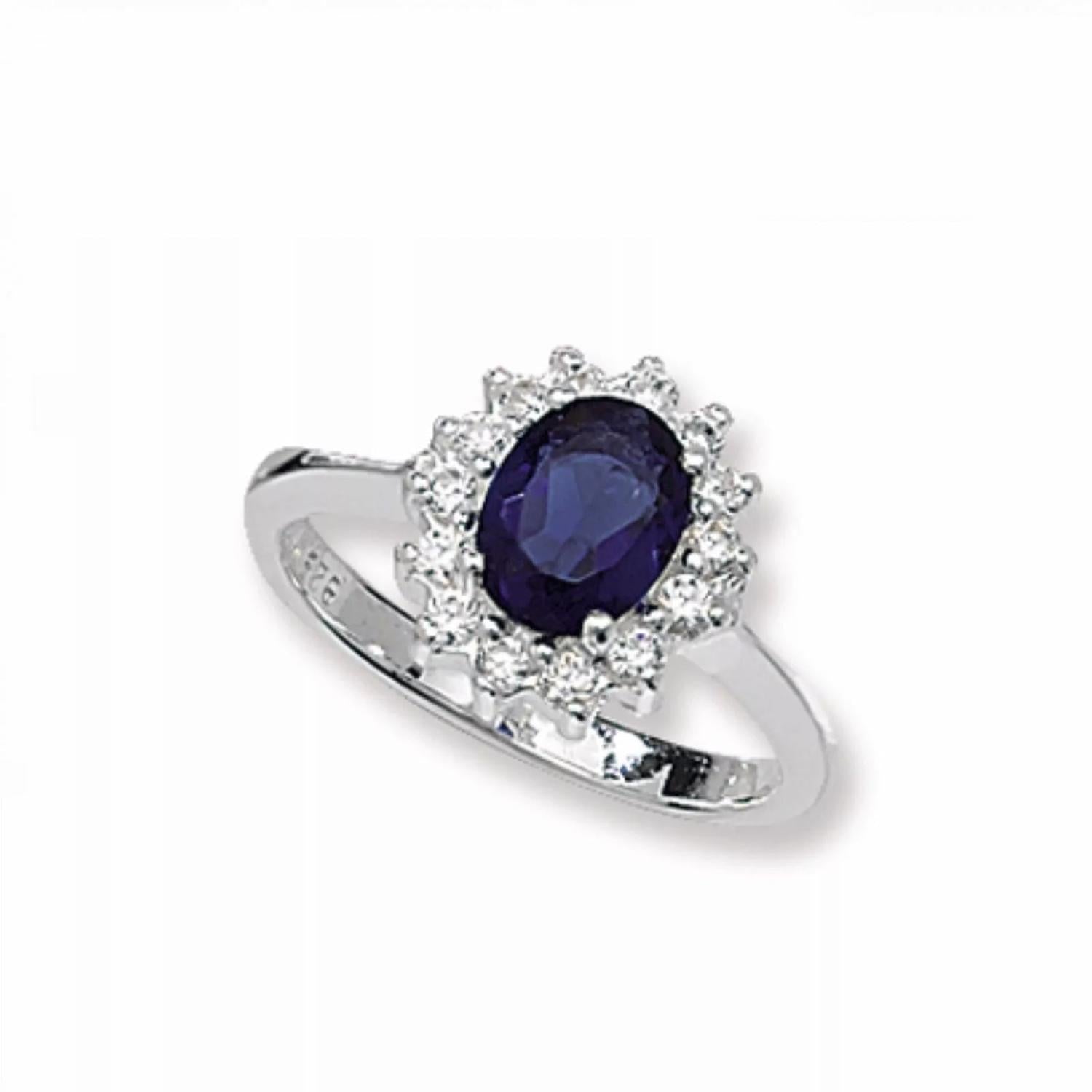 Sterling silver sapphire ring with oval blue sapphire and surrounding clear stones for women
