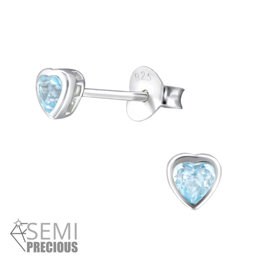 Melchior Jewellery sterling silver topaz heart stud earrings with blue gemstone in heart shape