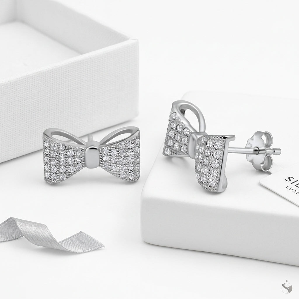 Melchior Jewellery Sterling Silver Pave Bow Earrings with sparkling clear crystals on elegant silver bows