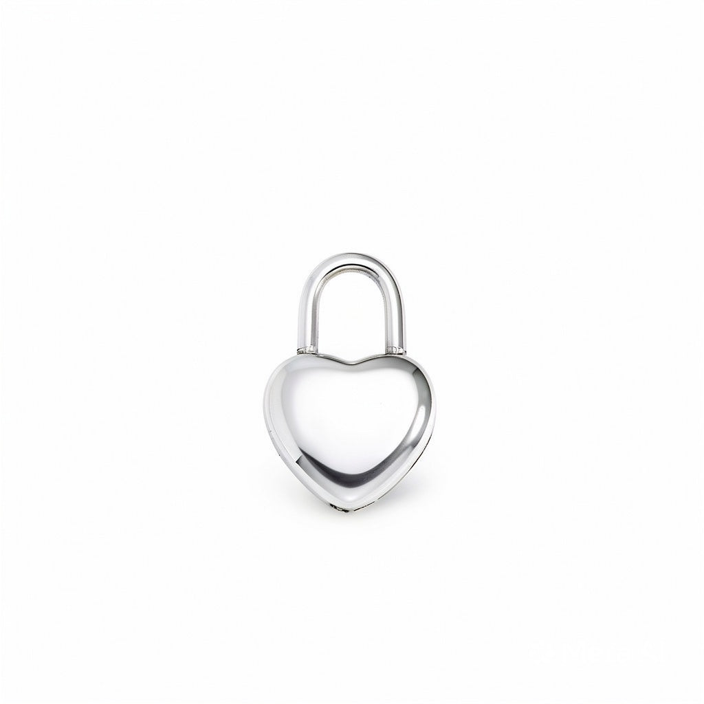 sterling silver heart lock charm by Melchior Jewellery shiny polished finish for elegant jewellery