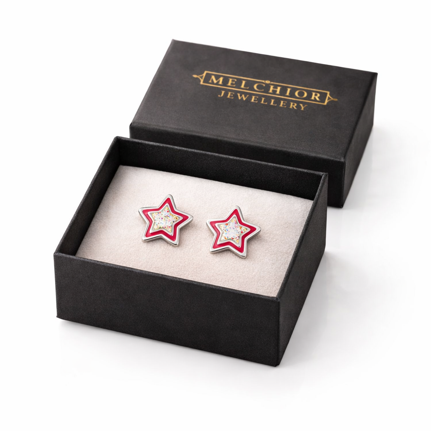 Kids Sterling Silver Sparkly Star Stud Earrings in red and silver presented in Melchior Jewellery black gift box