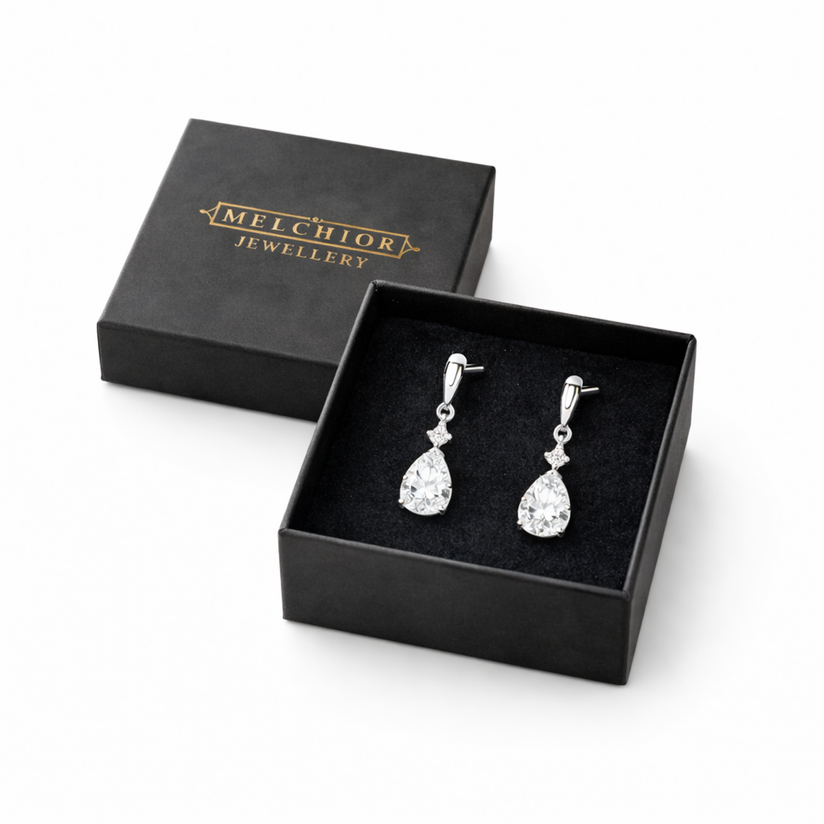 Sterling Silver CZ Teardrop Bridal Earrings by Melchior Jewellery displayed in black branded box