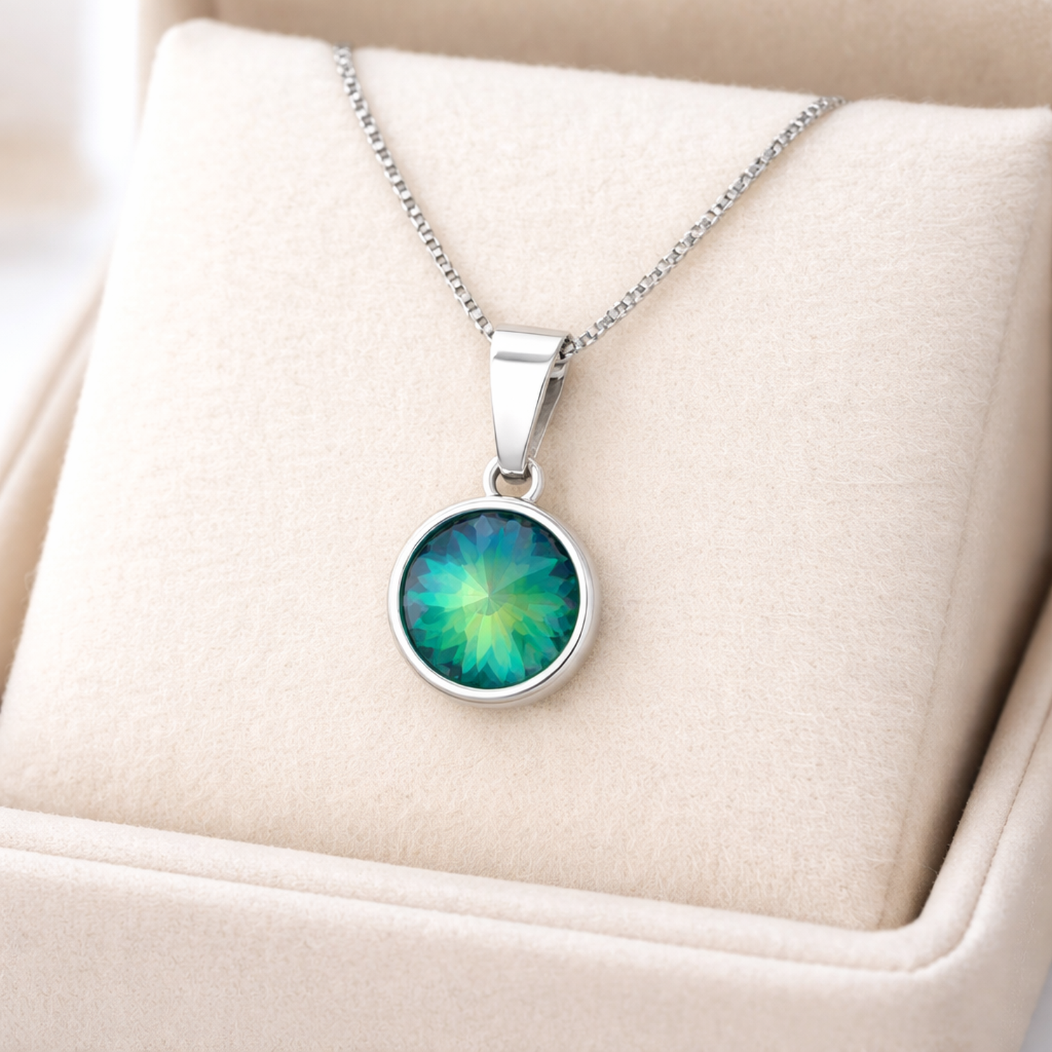 Melchior Jewellery sterling silver necklace with Swarovski crystals featuring a round green-blue crystal pendant