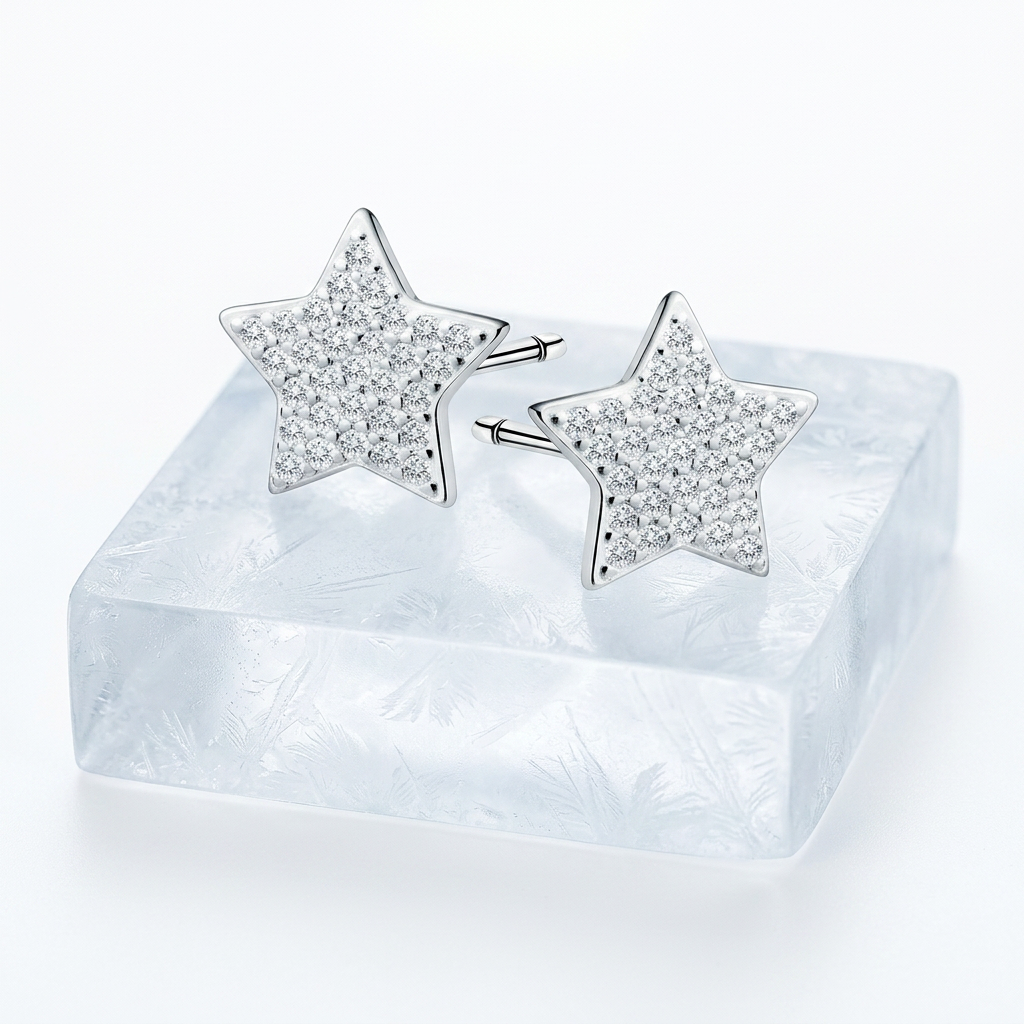 Melchior Jewellery sterling silver star stud earrings with sparkling crystals on a frosted block