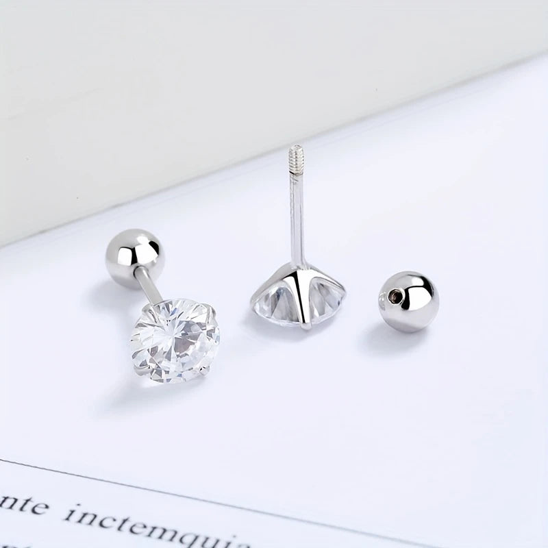 Tiny CZ screw back earrings for children by In Season Jewellery with clear stones and silver screw backs