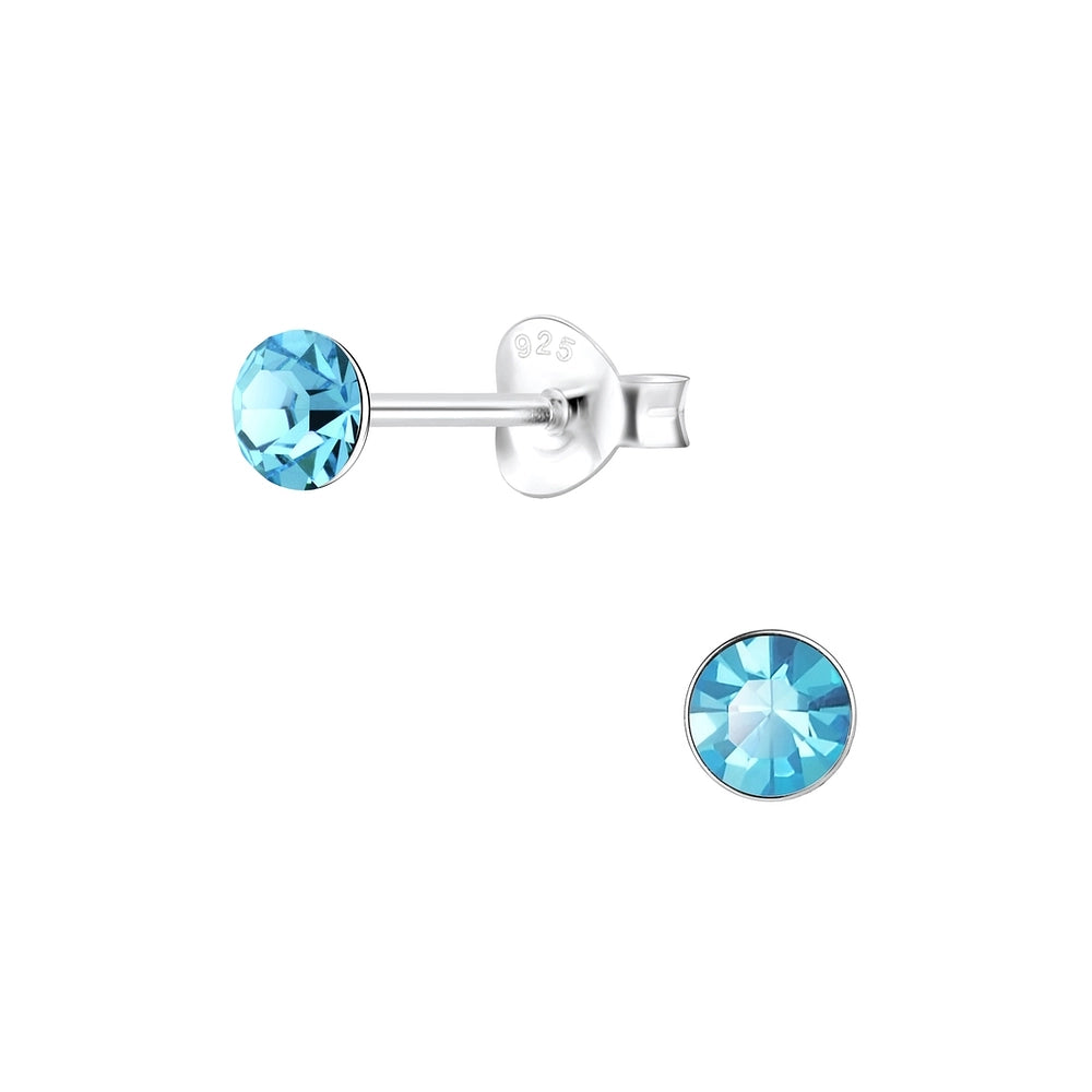 4mm round cubic zirconia earrings for children by Melchior Jewellery with blue stones and sterling silver setting