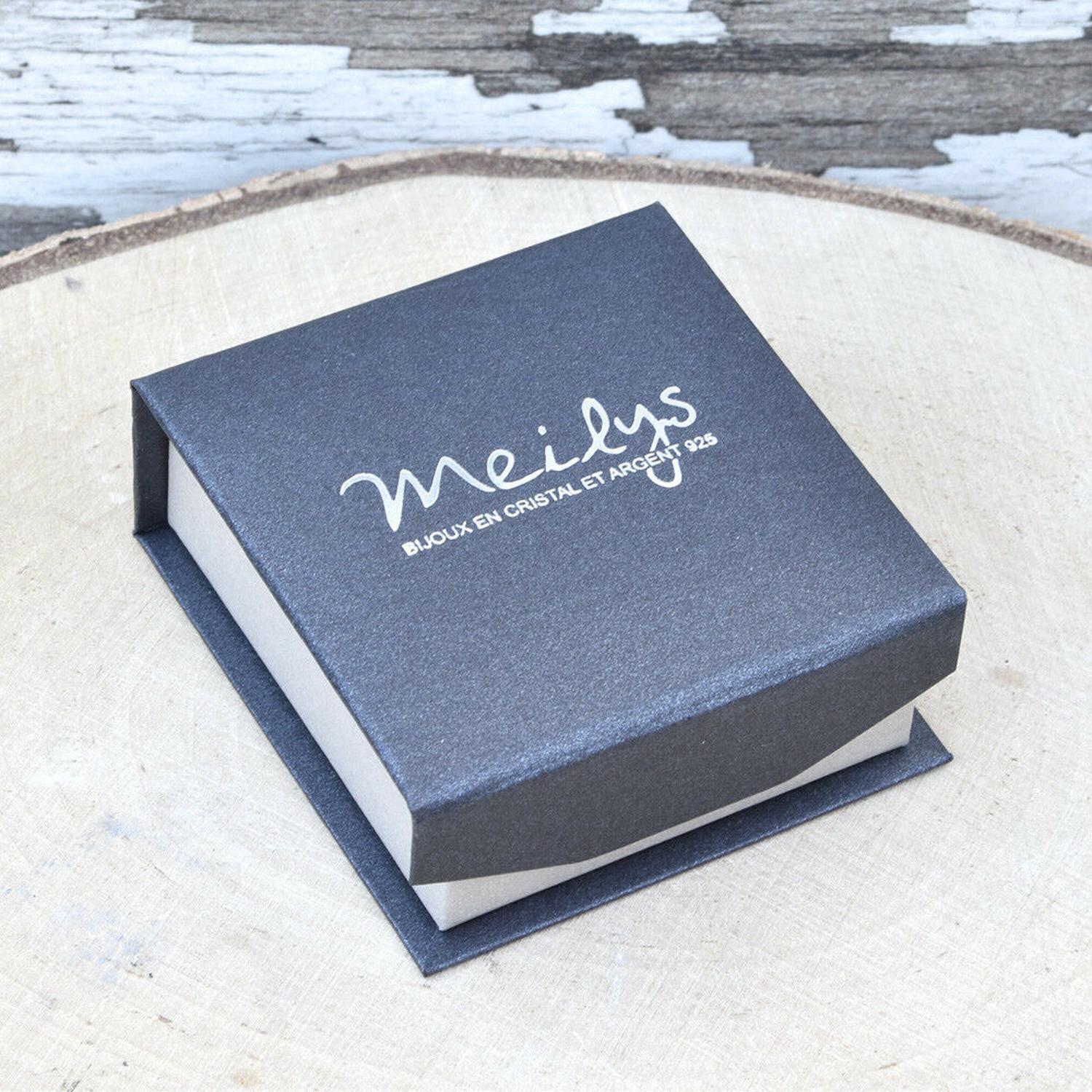 Navy jewellery presentation box with Meilys logo on wooden surface for AB crystal sterling silver earrings
