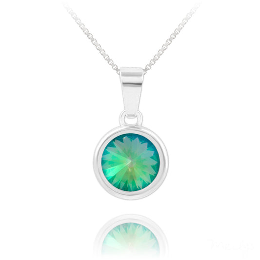 Sterling silver necklace with Swarovski crystals featuring a round green crystal pendant by Melchior Jewellery