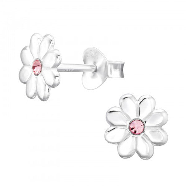 Children's sterling silver daisy earrings with pink centre stones by Melchior Jewellery