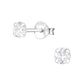 Children's sterling silver stud earrings by Melchior Jewellery with clear round gemstones