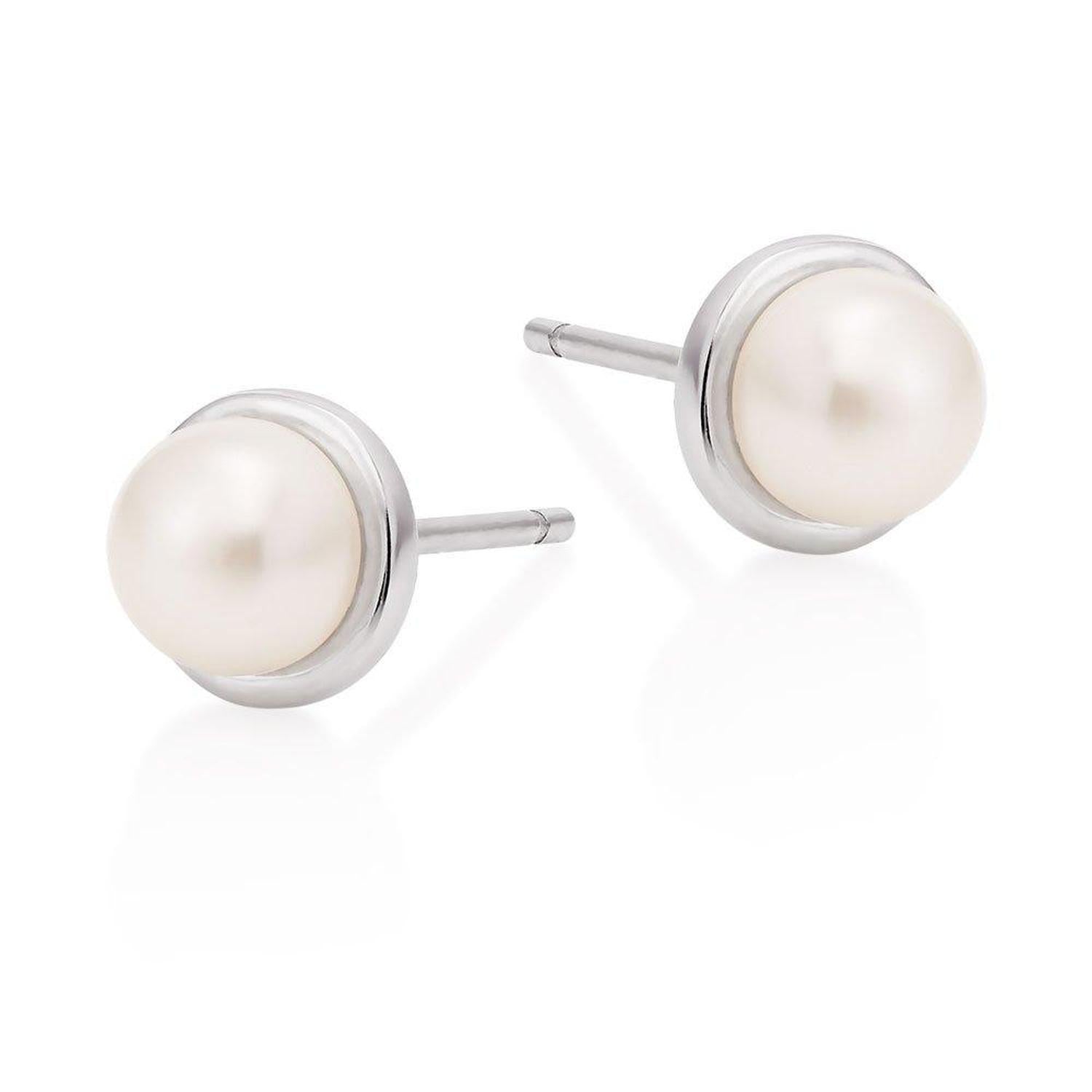 Melchior Jewellery white cultured pearl stud earrings set in polished silver studs for elegant women