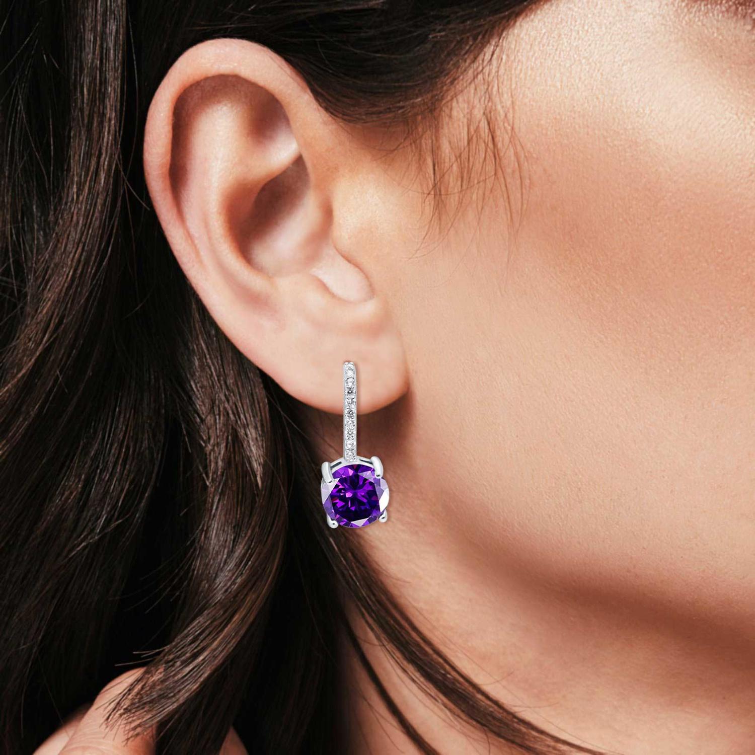 Melchior Jewellery woman's earrings featuring a vivid purple amethyst Febuary Birthstone Earrings with silver setting