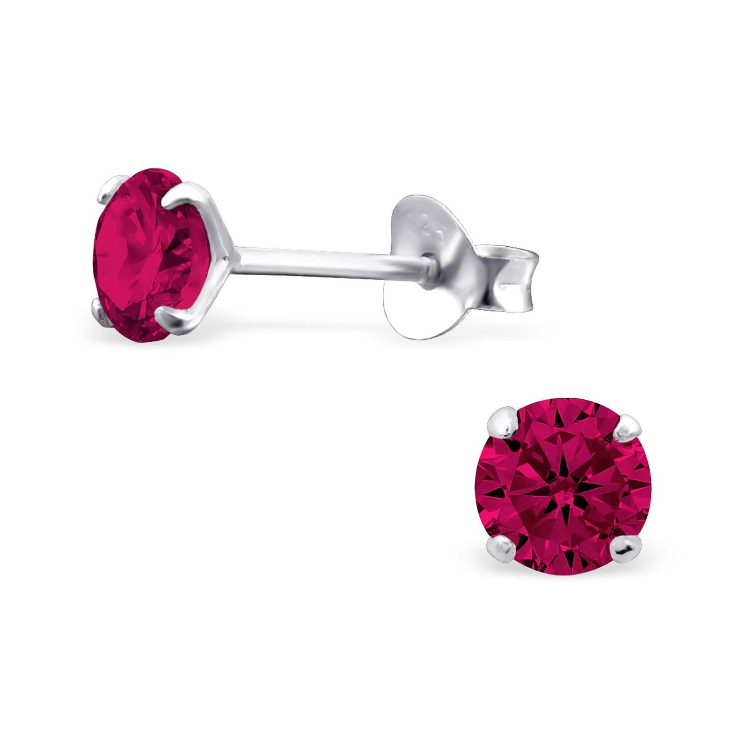 Melchior Jewellery girls birthstone stud earrings with vibrant red gemstone in silver setting