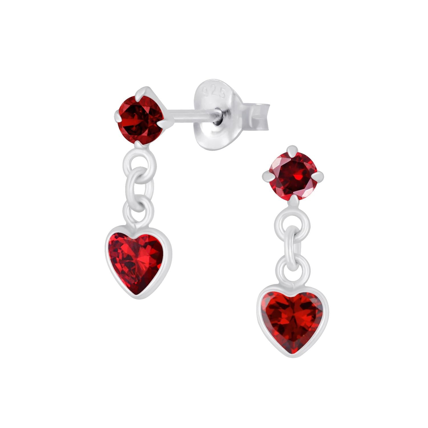Girls sterling silver heart earrings with vibrant red heart-shaped gemstones and a linked dangle design