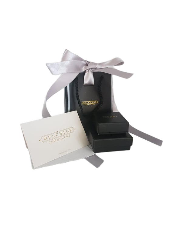 Melchior Jewellery luxury jewellery gift wrap with black boxes, shopping bag and pink ribbon bow