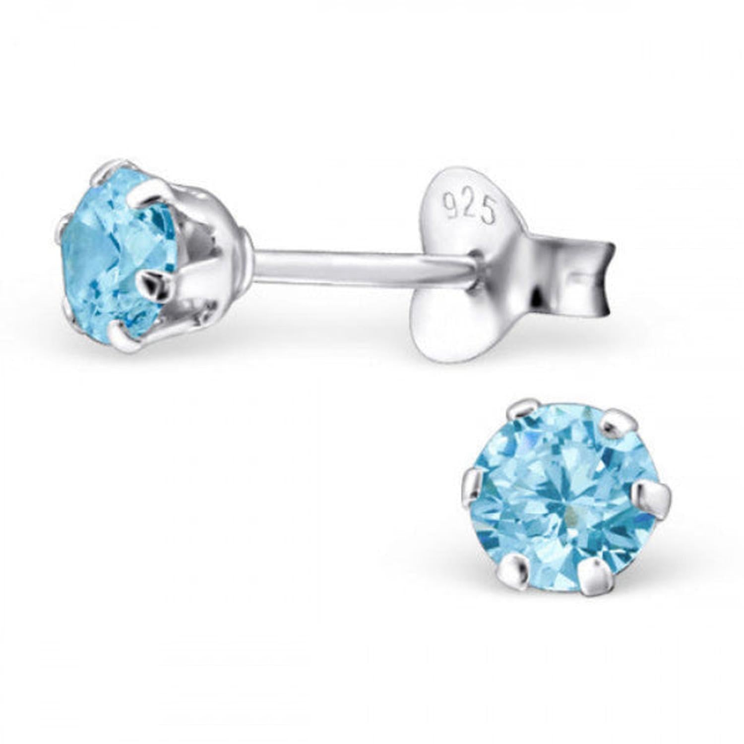 Sterling silver aqua stud earrings with bright light blue round gemstones by Melchior Jewellery