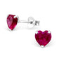 Melchior Jewellery sterling silver birthstone heart earrings with deep red heart-shaped stones