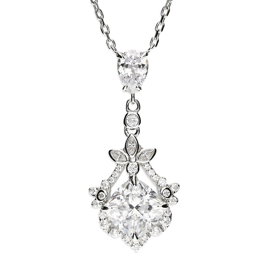 Sterling silver bridal necklace by Melchior Jewellery with intricate floral pendant and sparkling stones