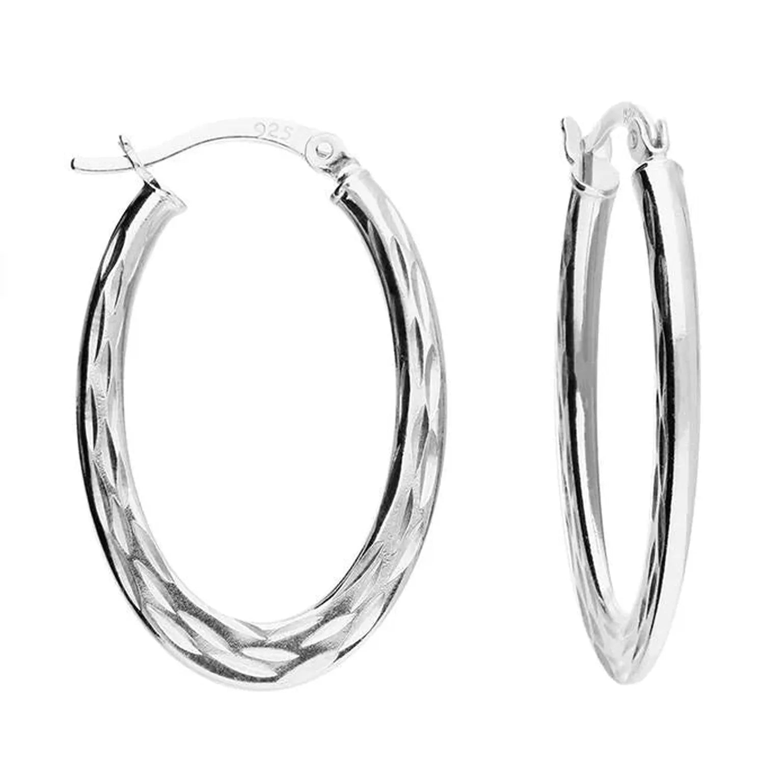 Melchior Jewellery sterling silver oval hoop earrings with textured pattern on polished silver surface