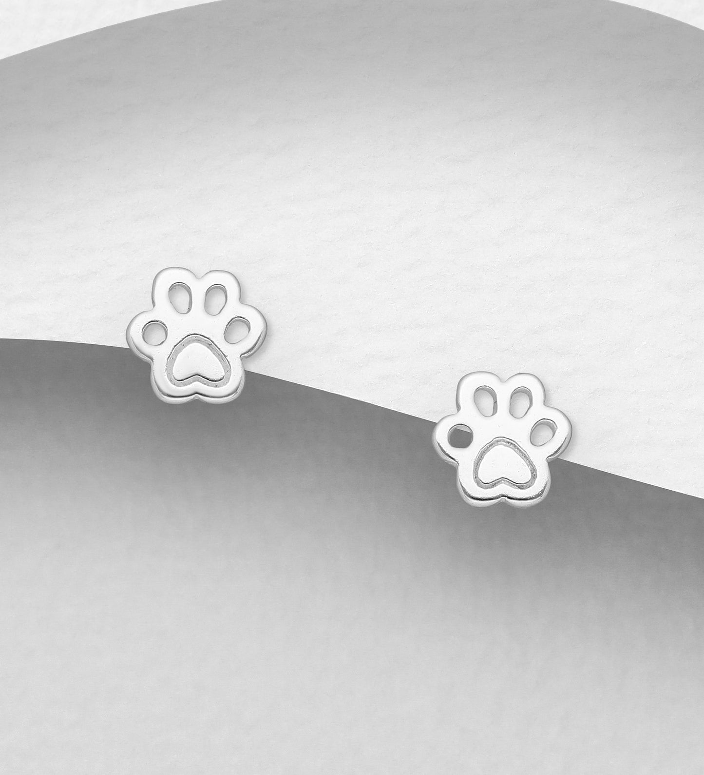 Melchior Jewellery sterling silver paw print earrings for women with a simple and elegant design