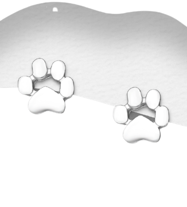 Sterling silver paw print stud earrings by Melchior Jewellery on white backing card