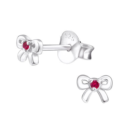 Tiny bow sterling silver children's earrings with red gemstone centre by Melchior Jewellery