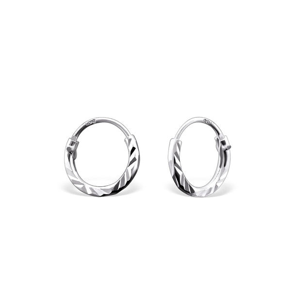 Melchior Jewellery tiny diamond cut hoop earrings for kids in polished silver finish