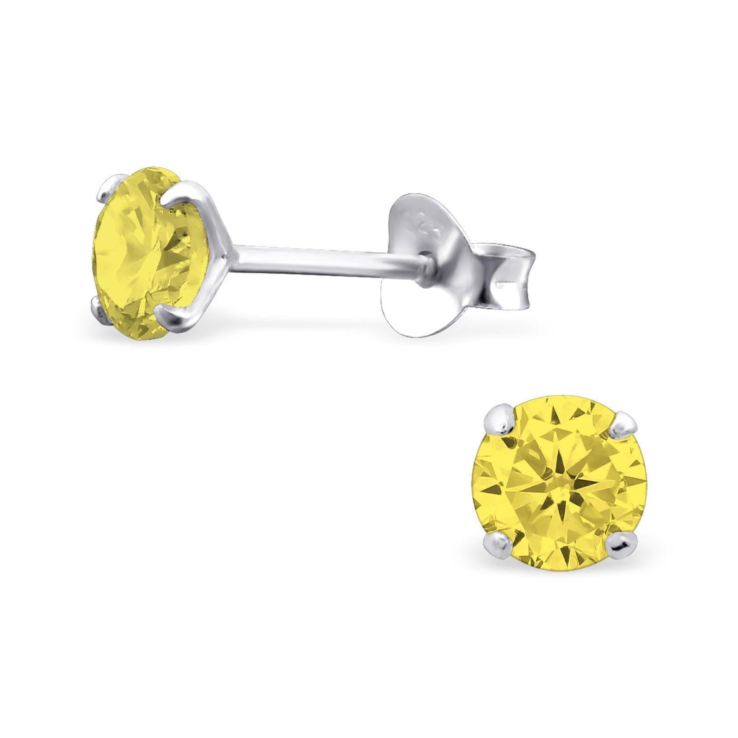 Sterling silver birthstone earrings with yellow round-cut gemstone studs by Melchior Jewellery